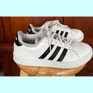 Adidas  womens size 7.